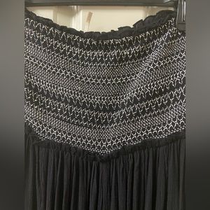 Free People strapless flowy romper! Super cute. Can dress up or down!